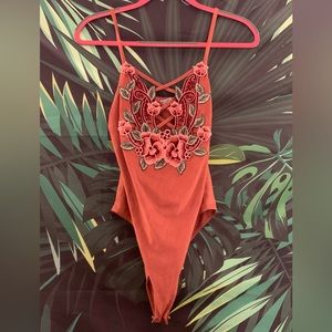 Charlotte Russe Flower Bodysuit in Burgundy Red